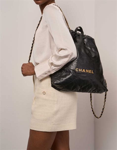 chanel black chevron denim backpack|Chanel 22 backpack.